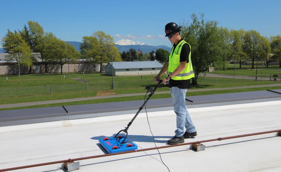 Roof leak repair crew at work
